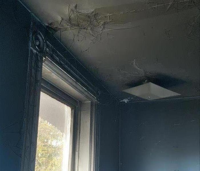 Here to Help - image of soot webs on ceiling