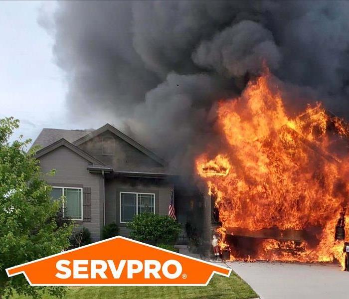 Pictured above is a house that has caught fire with the servpro logo.